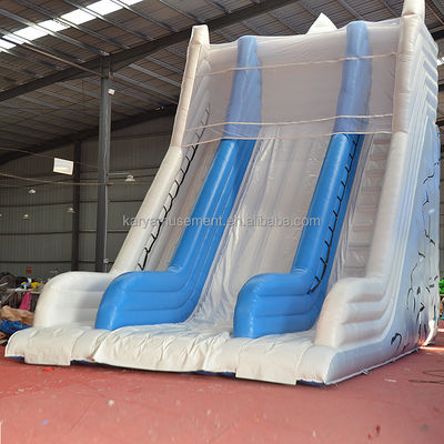 Grande montagne de neige blanche double glissade et toboggan gonflable pour adultes