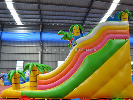 Jeu de parc en plein air à 2 voies, palmier tropical en PVC gonflable, trampoline à saut de dinosaure