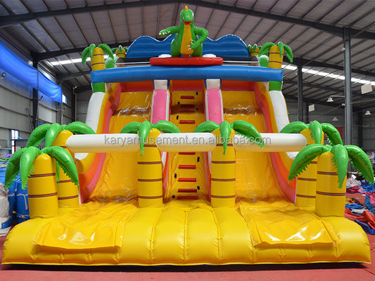 Jeu de parc en plein air à 2 voies, palmier tropical en PVC gonflable, trampoline à saut de dinosaure