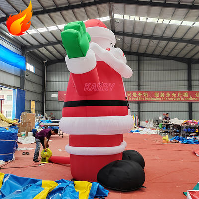 Fête de Noël chaude de 4 mètres de hauteur, le Père Noël gonflable géant avec des caractéristiques portables
