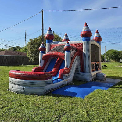 Les enfants unisexes jouent à une maison gonflable avec piscine à toboggan et matériel PVC commercial