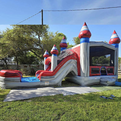 Les enfants unisexes jouent à une maison gonflable avec piscine à toboggan et matériel PVC commercial