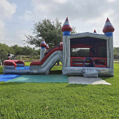 Les enfants unisexes jouent à une maison gonflable avec piscine à toboggan et matériel PVC commercial