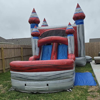 Les enfants unisexes jouent à une maison gonflable avec piscine à toboggan et matériel PVC commercial