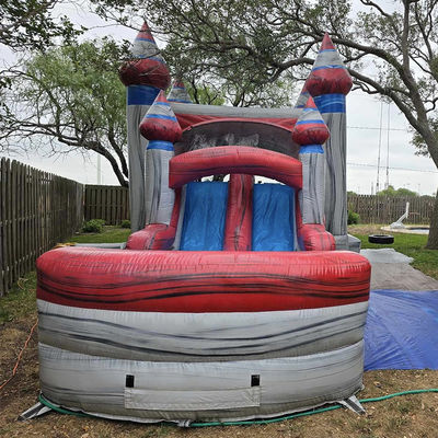 Les enfants unisexes jouent à une maison gonflable avec piscine à toboggan et matériel PVC commercial