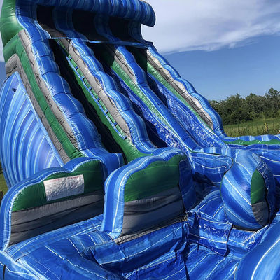 Parc aquatique extérieur en forme d'onde gonflable avec double glissière en PVC bleu
