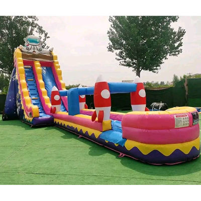 Piscine gonflable à thème astronaute commercial avec grand toboggan à eau et long toboggan à fusée