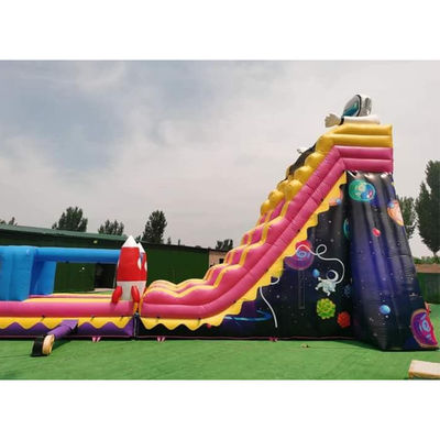 Piscine gonflable à thème astronaute commercial avec grand toboggan à eau et long toboggan à fusée