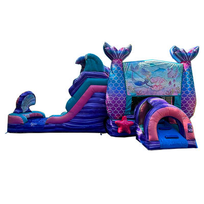 Château gonflable de sirène coloré avec toboggan et location de soirée de piscine