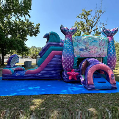 Château gonflable de sirène coloré avec toboggan et location de soirée de piscine