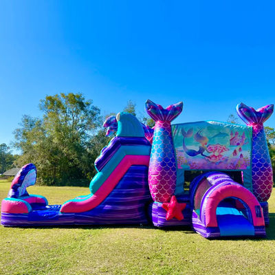 Château gonflable de sirène coloré avec toboggan et location de soirée de piscine