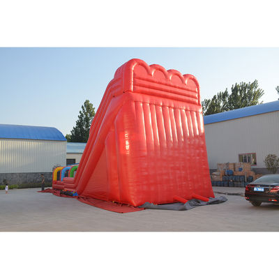 Essentiel pour l'été, toboggan gonflable multicolore avec piscine et fermeture automatique