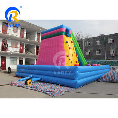 Des glissières sèches gonflables extérieures de couleur personnalisée avec double voie et mur d'escalade