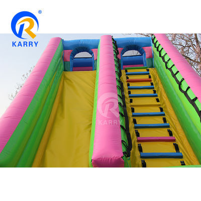 Des glissières sèches gonflables extérieures de couleur personnalisée avec double voie et mur d'escalade