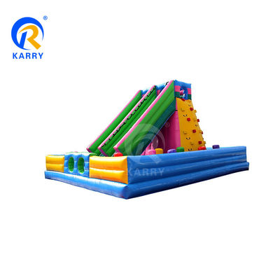 Des glissières sèches gonflables extérieures de couleur personnalisée avec double voie et mur d'escalade