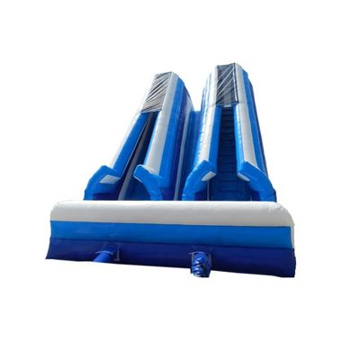 Glissière gonflable à l'eau à l'intérieur avec une grande voie double et une piscine combo humide